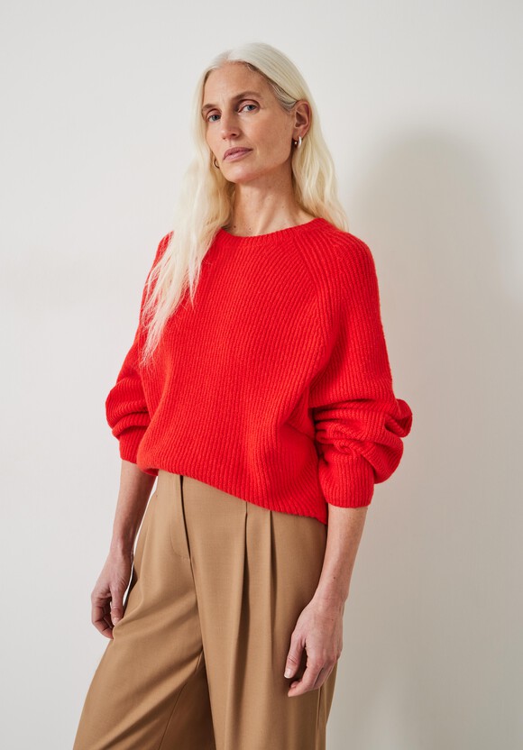 Red knitted jumper